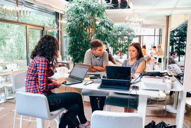 stock-photo-people-business-working-plants-office-teamwork-talking-corporate-computers-4b41f926-a42b-4230-bf77-dd084abcca67